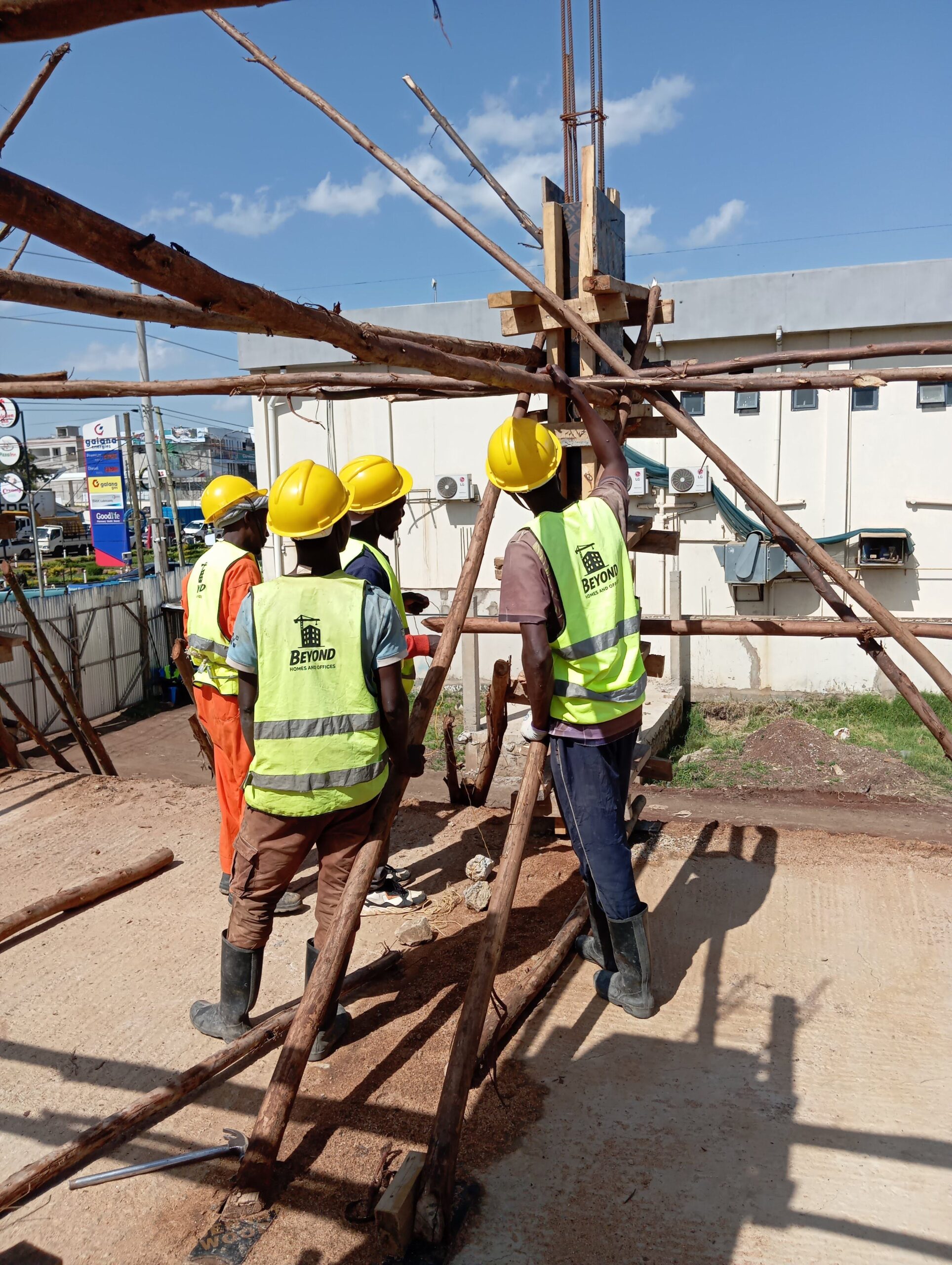 Beyond Homes and Offices workers bracing reinforced concrete column formwork